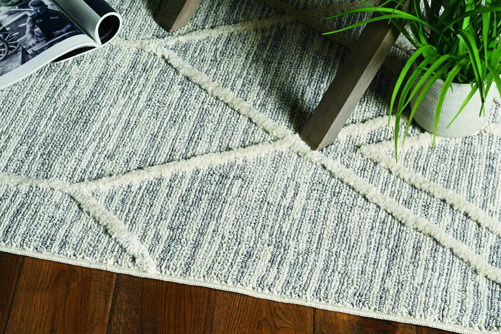 HomeRoots 5'X8' Ivory Grey Machine Woven Abstract with Fringe Indoor Area Rug