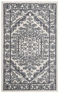 SAFAVIEH Adirondack Collection Accent Rug - 26 x 4, Ivory & Navy, Oriental Medallion Design, Non-Shedding & Easy Care, Ideal f