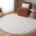 Safavieh Moroccan Tassel Shag Collection Area Rug - 67 Round, Ivory, Moroccan Design, Ideal for High Traffic Areas in Living Ro