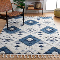 SAFAVIEH Moroccan Tassel Shag Collection Area Rug - 67 x 92, Blue & Ivory, Boho Design, Non-Shedding & Easy Care, 2-inch Thick