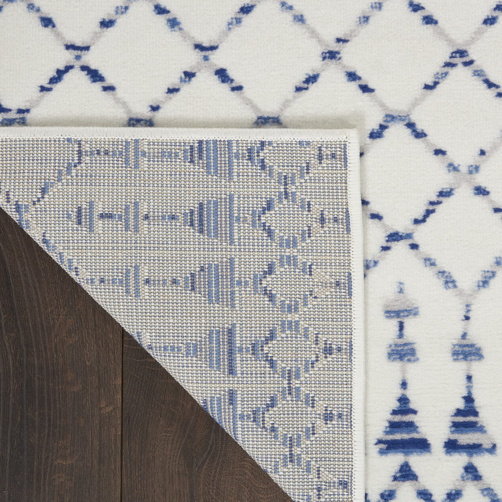 HomeRoots 100% Polypropylene 6’ x 9’ Ivory and Blue Berber Pattern Area Rug