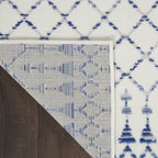 HomeRoots 100% Polypropylene 6’ x 9’ Ivory and Blue Berber Pattern Area Rug