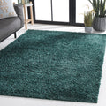 SAFAVIEH August Shag Collection Area Rug - 53 x 76, Green, Solid Design, Ideal for High Traffic Areas in Living Room, Bedroom 