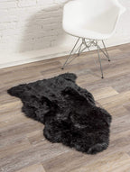 HomeRoots 2' X 3' Black New Zealand Natural Sheepskin Rug