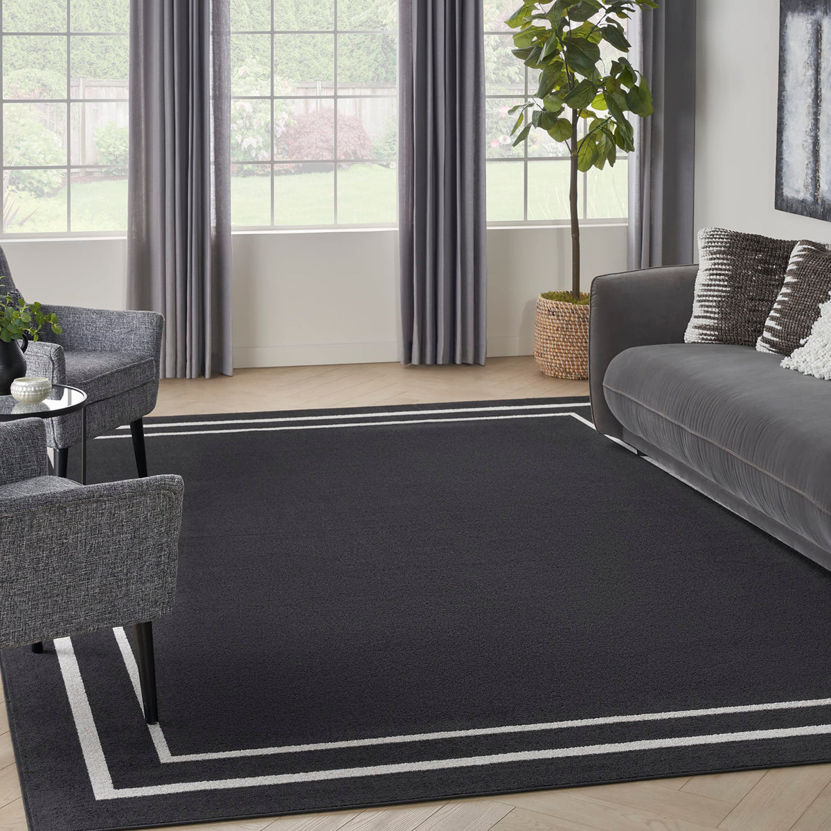 Nourison Essentials 10' X 14' Black Ivory Contemporary Indoor/Outdoor Rug