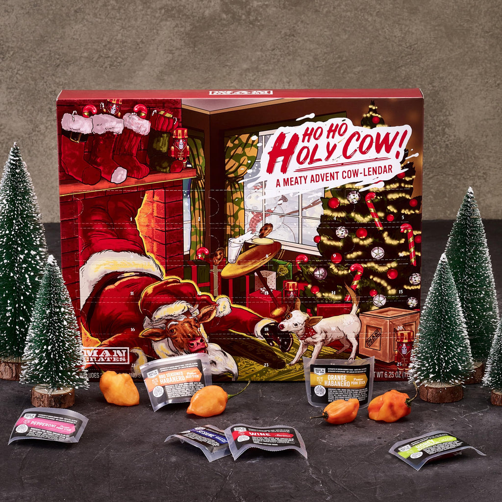 Man Crates Jerky Advent Calendar 2024 - 25 Beef Jerky Bites in Red with Ho-Ho-Holy Cow Artwork - Flavors: Orange Habanero, Rootbeer