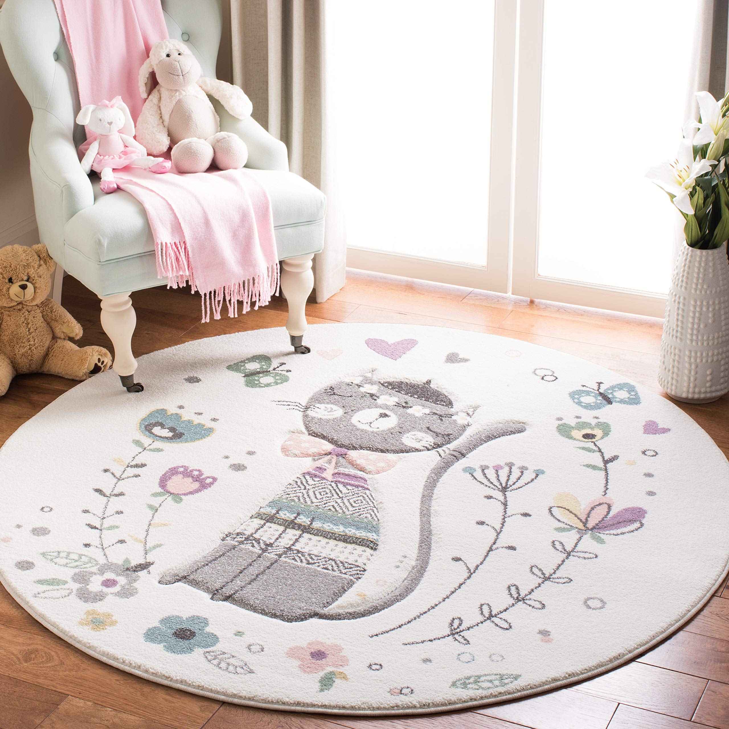 SAFAVIEH Carousel Kids Collection Area Rug - 53 Round, Ivory & Pink, Cat Design, Non-Shedding & Easy Care, Ideal for High Traff
