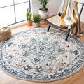 SAFAVIEH Madison Collection Area Rug - 67 Round, Ivory & Light Blue, Boho Chic Medallion Distressed Design, Non-Shedding & Easy