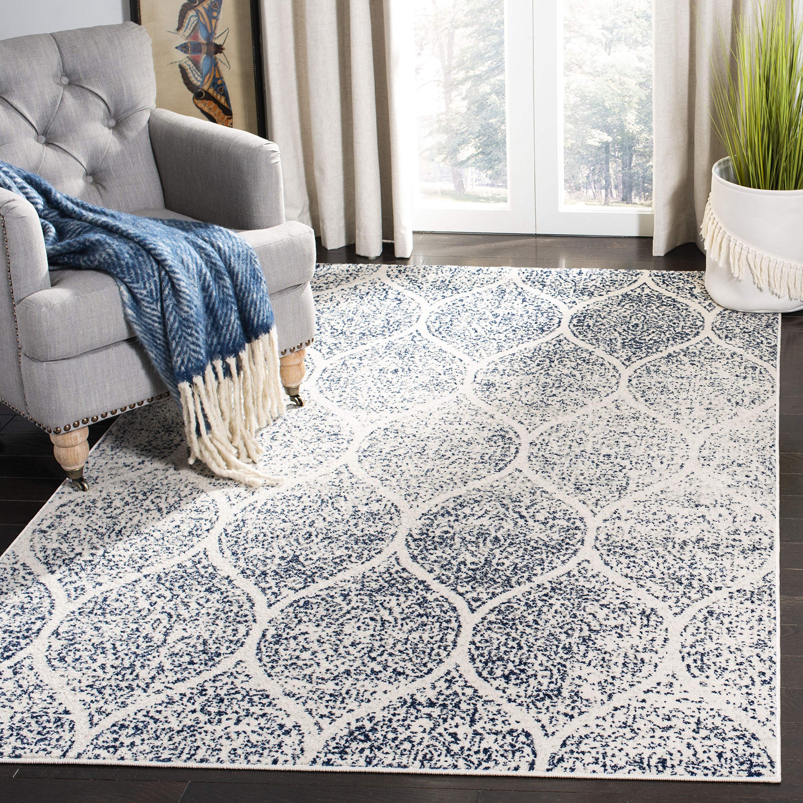 SAFAVIEH Madison Collection Area Rug - 67 x 92, Cream & Royal Blue, Glam Ogee Trellis Distressed Design, Non-Shedding & Easy C
