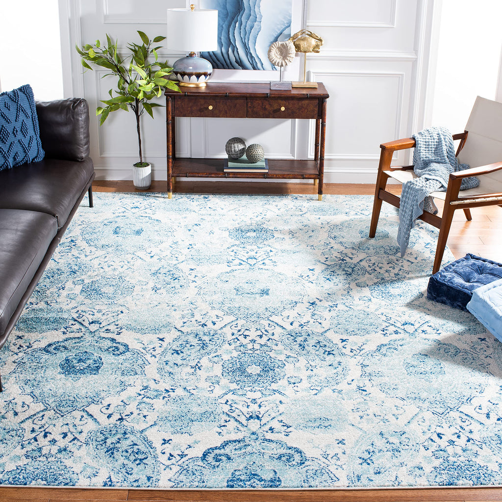 SAFAVIEH Madison Collection Area Rug - 6'7'' x 9'2'', Cream & Turquoise, Boho Chic Glam Paisley Design, Non-Shedding & Easy Care