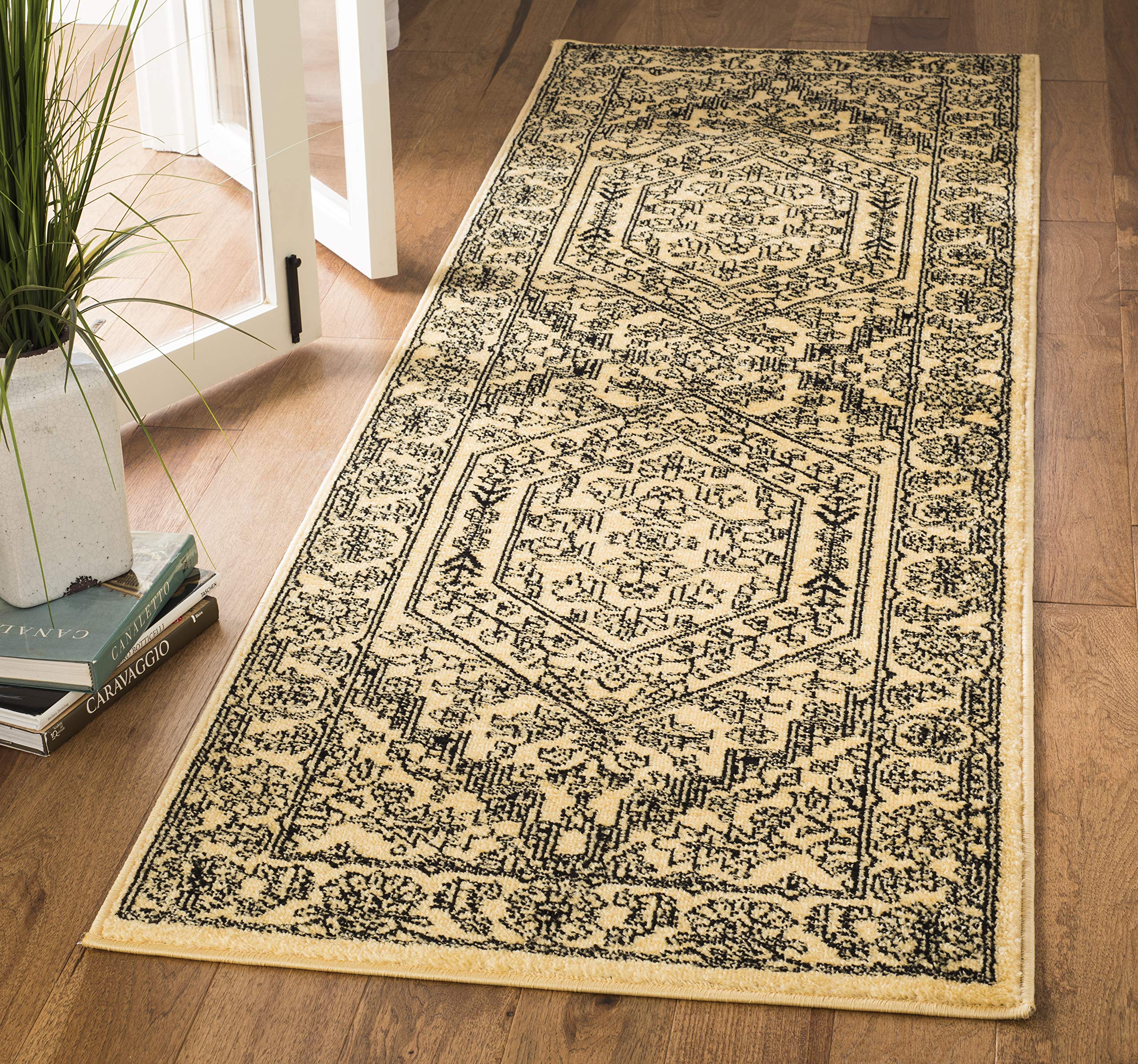 SAFAVIEH Adirondack Collection Runner Rug - 26 x 6, Gold & Black, Oriental Medallion Design, Non-Shedding & Easy Care, Ideal f