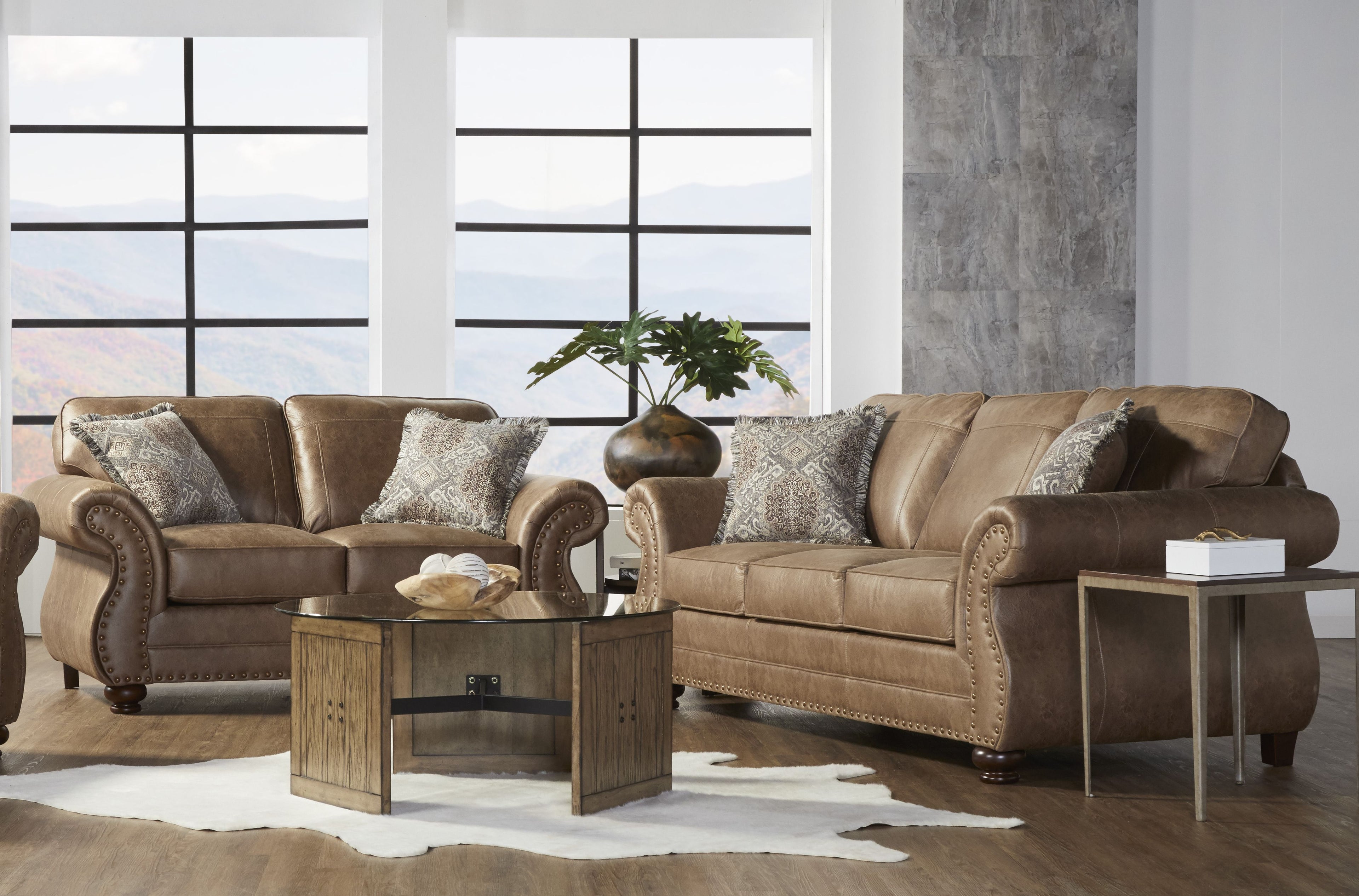 Leinster Faux Leather Sofa and Loveseat with Antique Bronze Nailheads