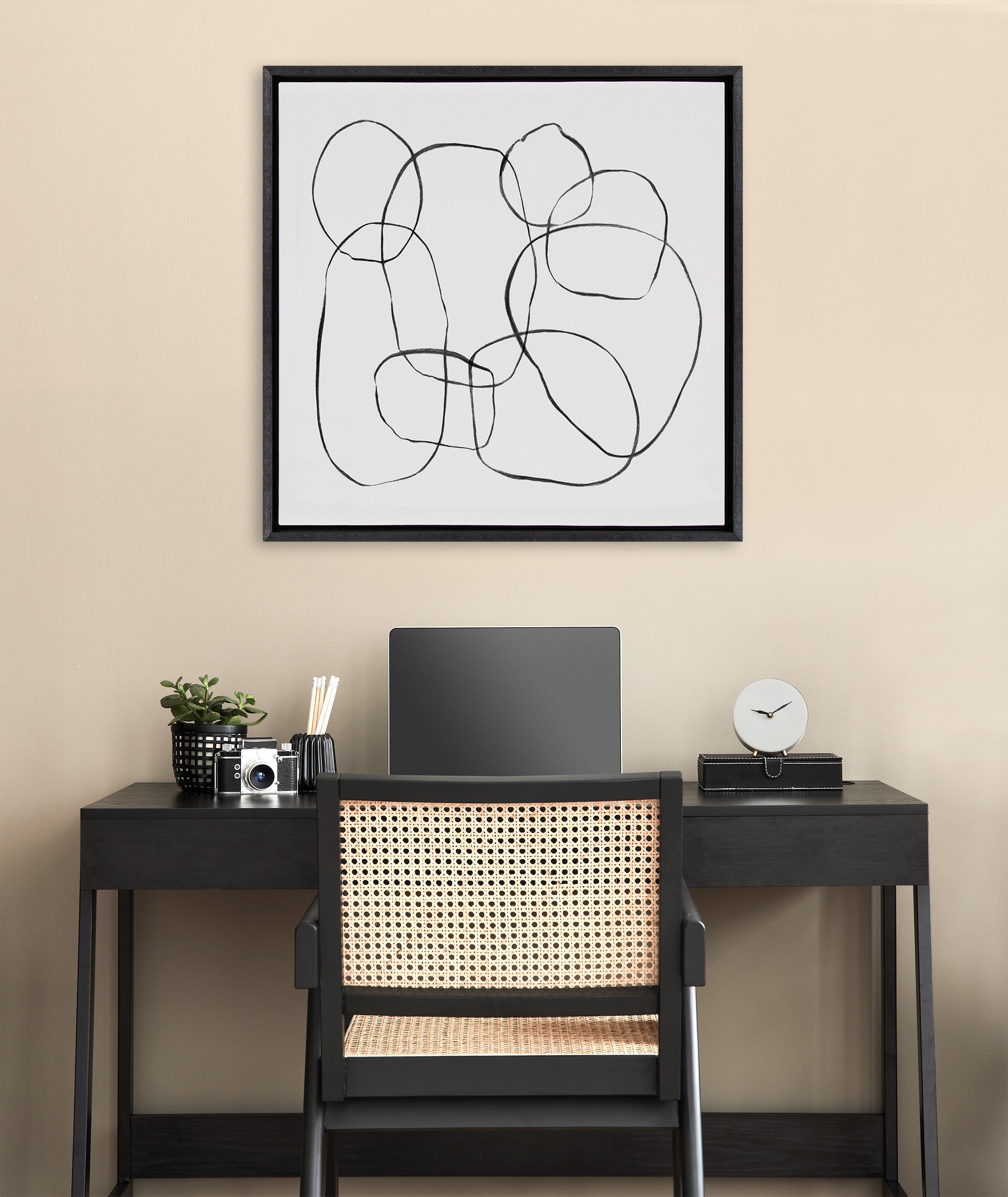 Sylvie Dancing Circles Black and Soft White Framed Canvas by Teju Reval of SnazzyHues