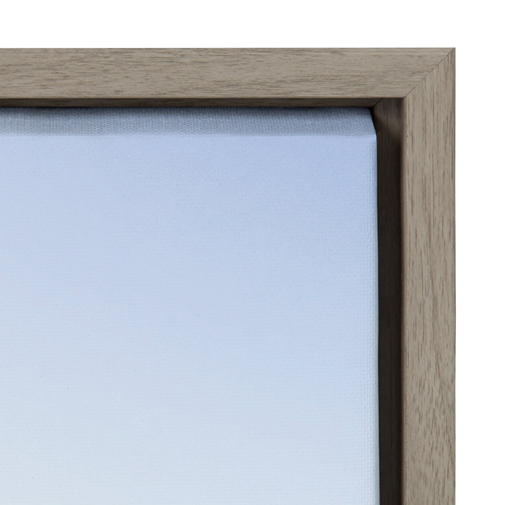 Sylvie Pale Blue Sea Framed Canvas by The Creative Bunch Studio
