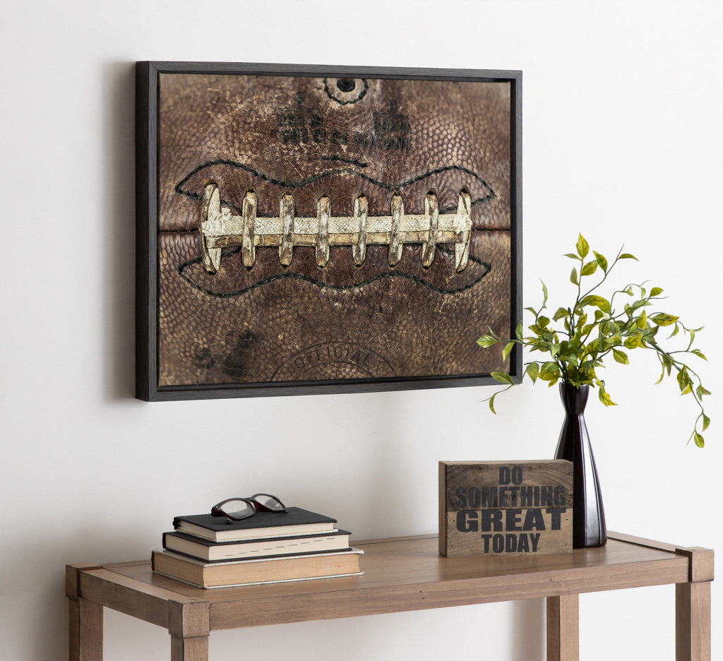 Sylvie Football Laces Framed Canvas by Shawn St. Peter