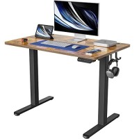 Fezibo Height Adjustable Electric Standing Desk, 40 X 24 Inches Stand Up Table, Sit Stand Home Office Desk With Splice Board, Black Frame/Rustic Brown Top