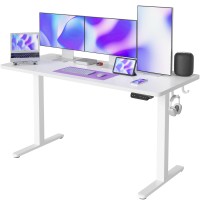 Fezibo Height Adjustable Electric Standing Desk, 55 X 24 Inches Stand Up Table, Sit Stand Home Office Desk With Splice Board, White Frame/White Top
