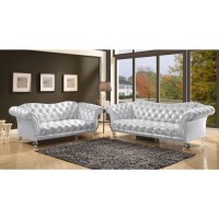 <li> Metallic Silver Fabric </li><li> Button Tufted </li><li> Tight Back& Seat Cushions </li><li> Seat Construction: Full Foam </li><li> Armrest: Rolled </li><li> Clear Acrylic Turned Bun Leg </li><li> </li>