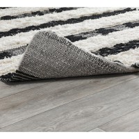 Loena Shag BlackIvory Handwoven Area Rug by Kosas Home