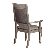 Glamorous platinum metallic finish with hand applied highlight glaze and curvaceous turned legsSleekly styled chairs are upholstered in metallic leatherette with button tufted backsCrafted from Asian hardwoodCoaster's exclusive design