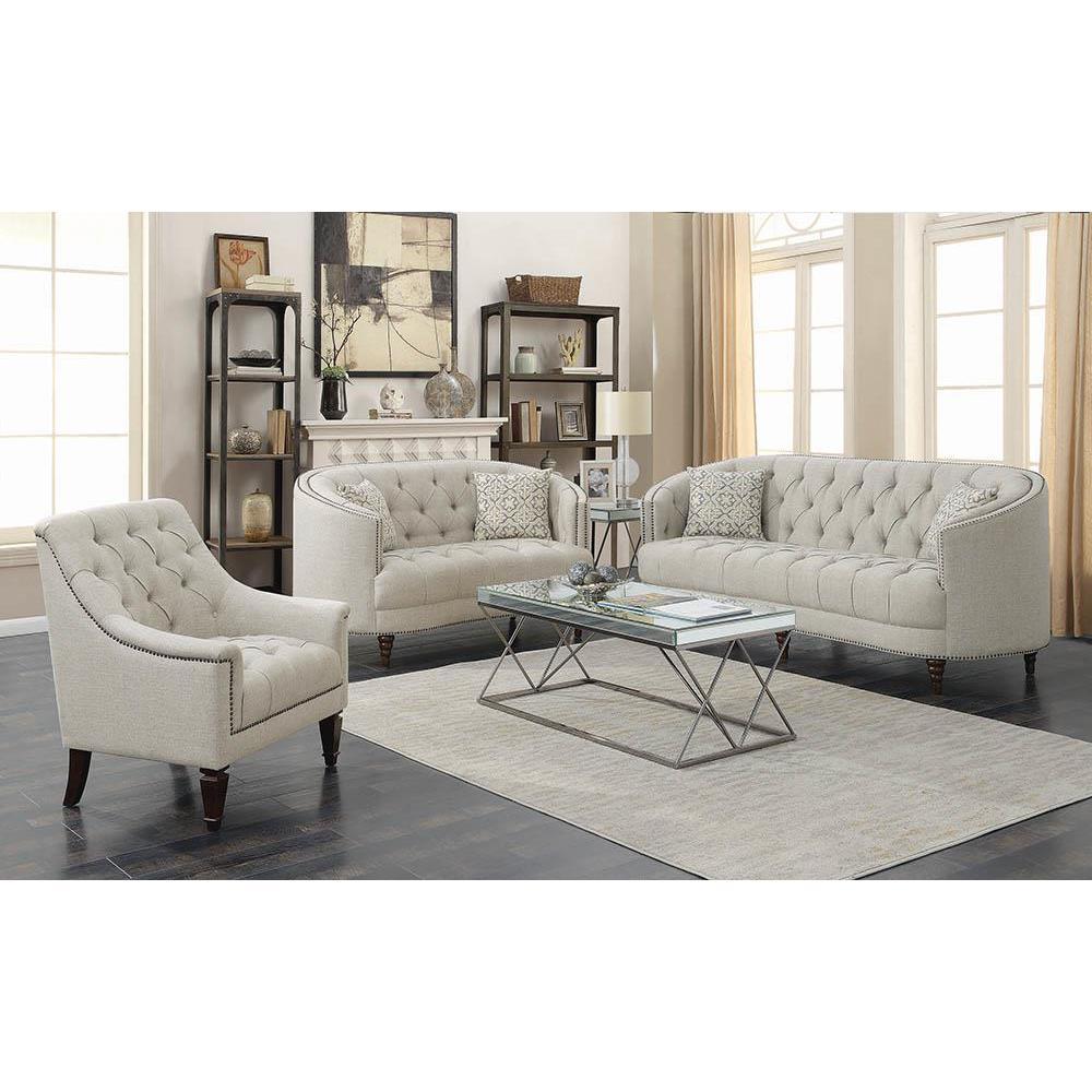 A modern spin on a classic traditional living room collectionSoft, grey linen-like upholsteryButton tufted seat and backrestBeautiful detailed solid wood legs create the perfect foundationThis collection is also available in grey velvet with chrome and si