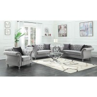 Eye-catching glam sofa collectionElegant rolled arms accented with individually placed chrome nailheadsInside arms and soft camel backrest beautifully tufted and adorned with sparkling crystalsQueen Anne legs in a chrome finish accentuate a graceful, curv