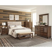 Chesterfield style upholstered bedScrolled button tufted headboardIndividually applied bronze nailhead trimAvailable in beige fabric, grey fabric, and brown leatheretteSolid birch legs in cappuccino finishAlso available as headboard onlyPine and plywood f