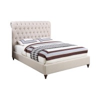 Chesterfield style upholstered bedScrolled button tufted headboardIndividually applied bronze nailhead trimAvailable in beige fabric, grey fabric, and brown leatheretteSolid birch legs in cappuccino finishAlso available as headboard onlyPine and plywood f