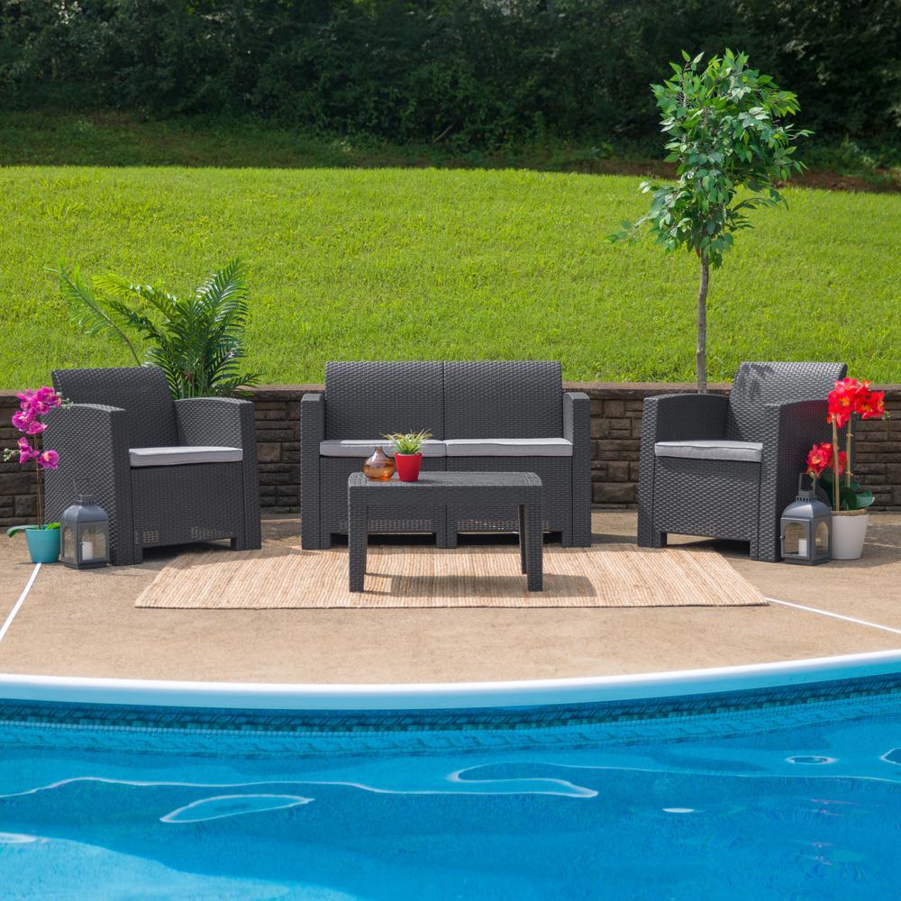 4 Piece Outdoor Faux Rattan Chair Loveseat and Table Set in Dark Gray