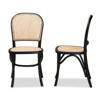 Baxton Studio Cambree Mid-Century Modern Brown Woven Rattan and Black Wood 2-Piece Cane Dining Chair Set