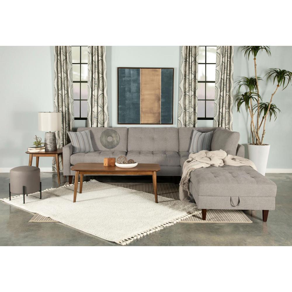 Two-piece reversible sectional is the perfect choice for any living room updateStylish modern loft designGrid button tufted seats and back pillowsExceptional tailoring with top stitch details and clean lines throughoutStriped pillows complement the warm n