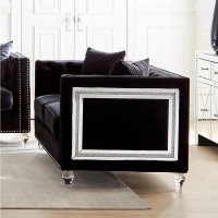 Elegant low profile button tufted shelter back sofa collection upholstered in a luxurious black velvetDouble row of small chrome, individually hammered nailheads frame the top back and armsOutside arms accented with a mitered mirror and acrylic crystal fr