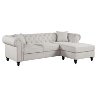 Versatile two-piece sectional with reversible chaise, ideal for a smaller room settingEasily change seating configuration by sliding ottoman base left or right, then flip to reverse chaise seat cushion to match arm cut outWide roll arms frame button tufte