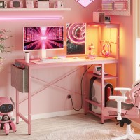 Bestier Pink Gaming Desk With Power Outlets, 44 Inch Led Gamer Desk With 4 Tiers Reversible Shelves, Pink Computer Desk With Headset Hook & Side Storage Bag For Bedroom (Pink 3D Carbon Fiber)