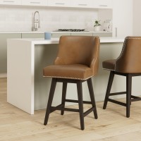 Chita Counter Height Swivel Barstools Fsc Certified 26 H Seat Height Upholstered Bar Stools Set Of 2 Faux Leather In Saddle